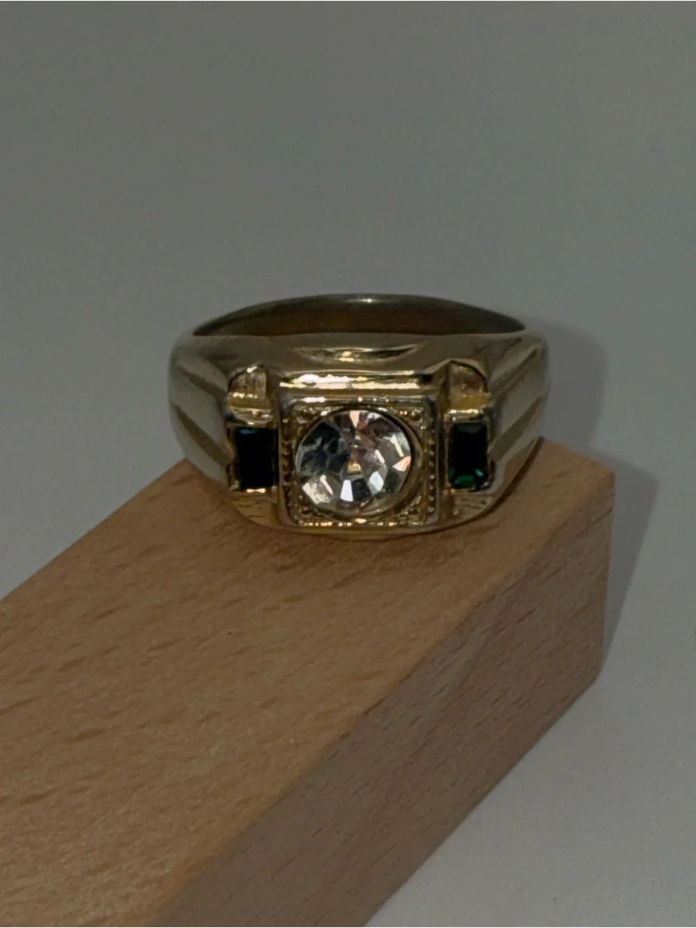 Gold-Tone Men's Signet Ring with Clear Center Stone and Green Accents